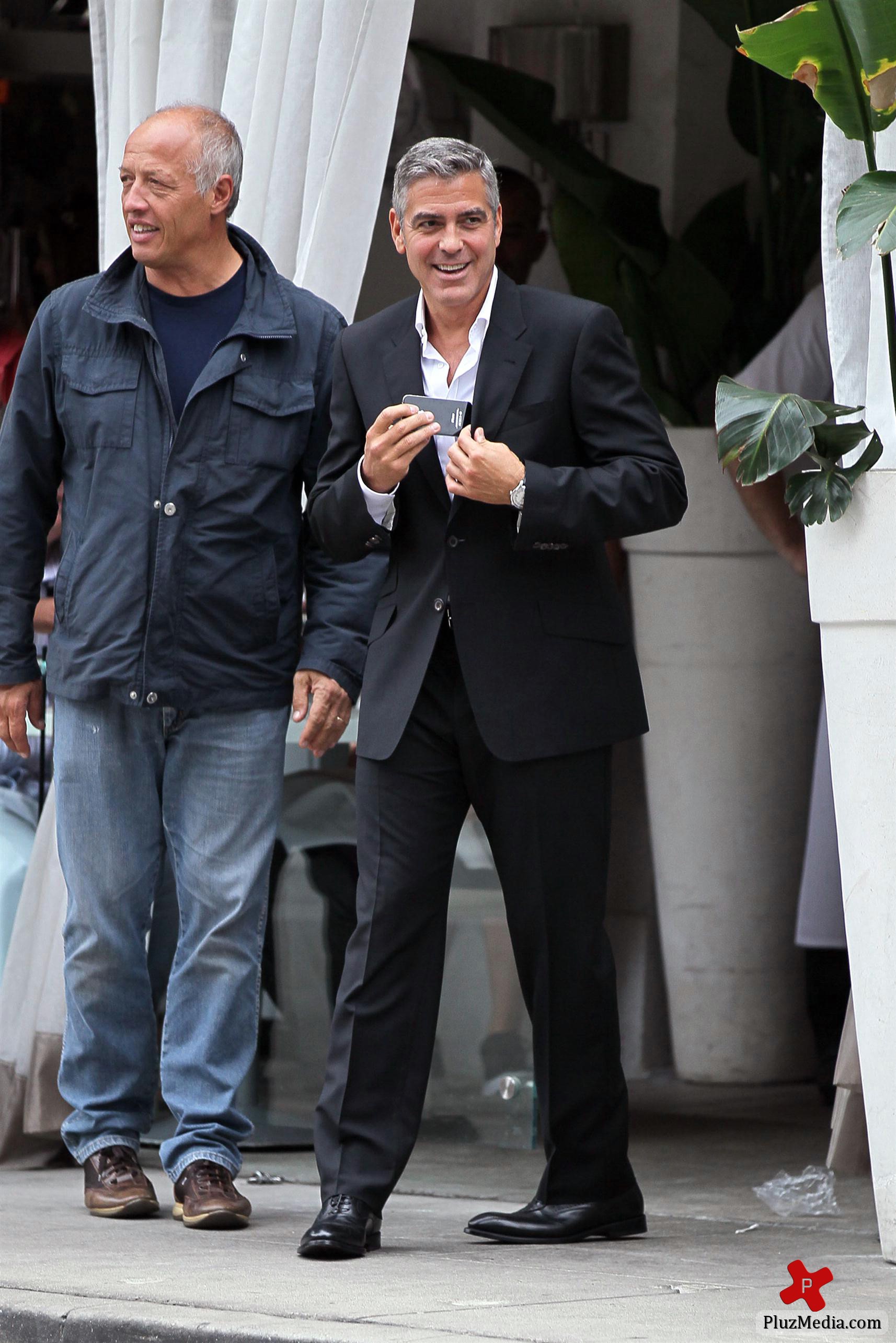 George Clooney on the set of a Mercedes Benz E300 L advert photos | Picture 78290